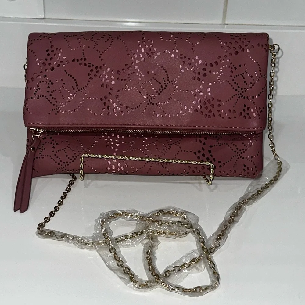 Urban Expressions Pink Laser Cut “Locket” Clutch. New without tags